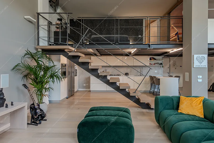 Zona living del loft Vanadio, location in stile moderno a Milano