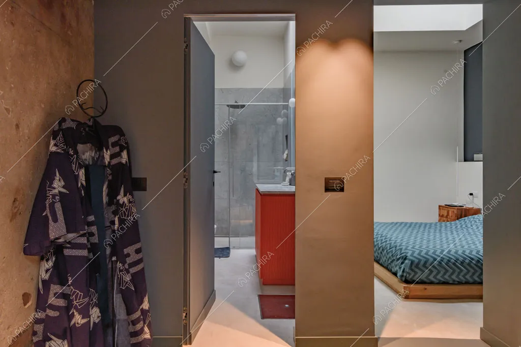 Camera da letto del loft Unakite, location in stile moderno a Milano