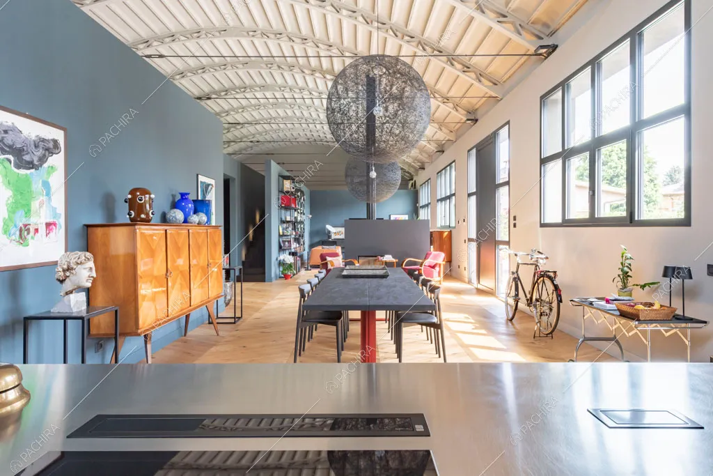Cucina del loft Danubio, location in stile contemporaneo a Brescia