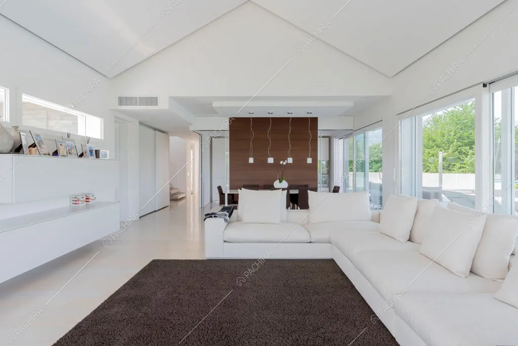 Zona living della villa Coral, location in stile contemporaneo a Como