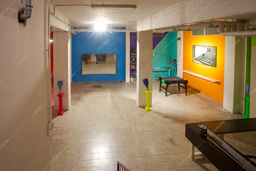 Open space dello spazio espositivo Paranà, location in stile minimal a Roma