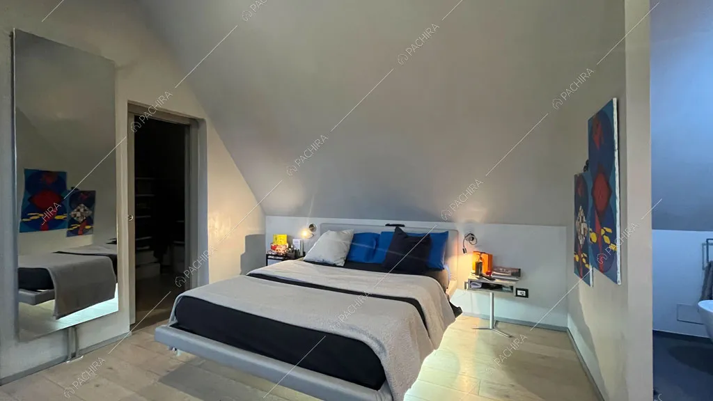 Camera da letto della villa Andesine, location in stile moderno a Roma