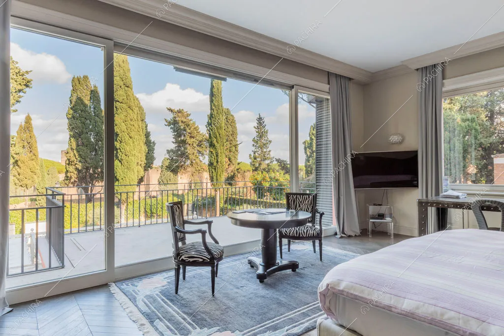 Camera da letto della villa Espero, location in stile contemporaneo a Roma