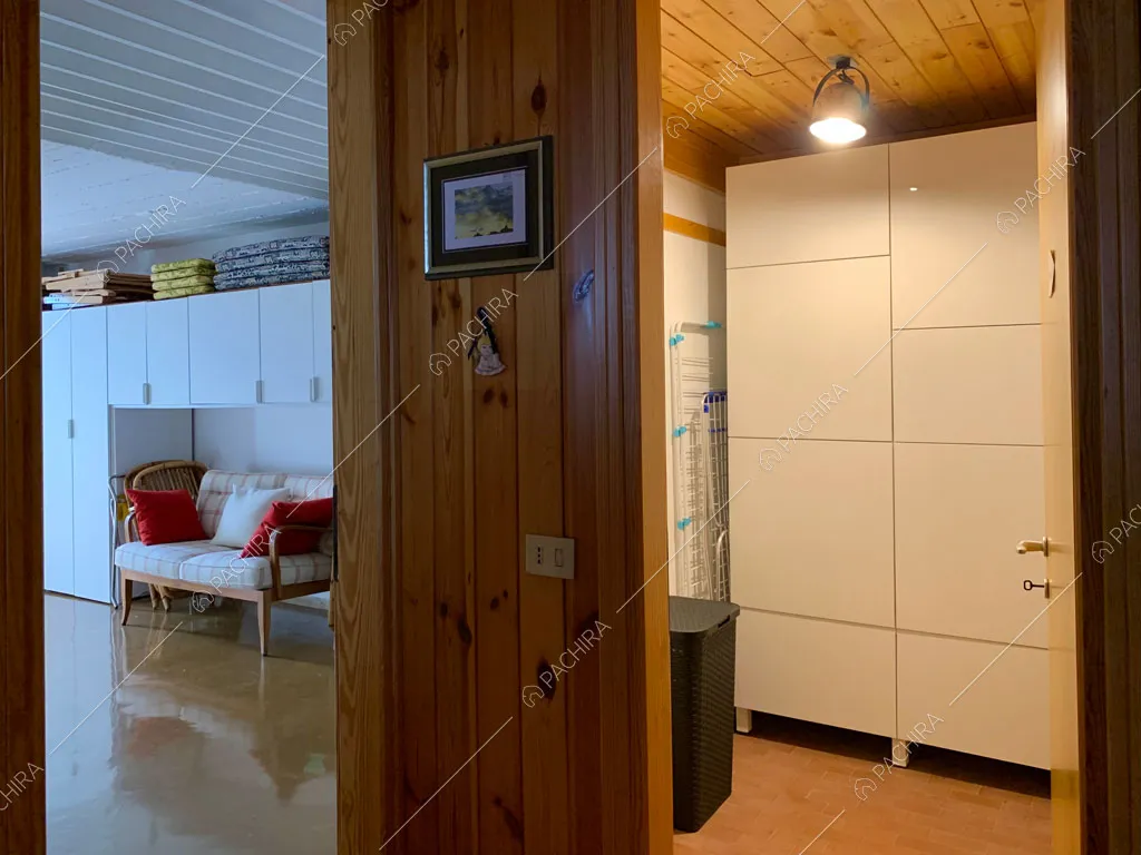 Camera da letto dello chalet Bulbine, location in stile moderno a Belluno