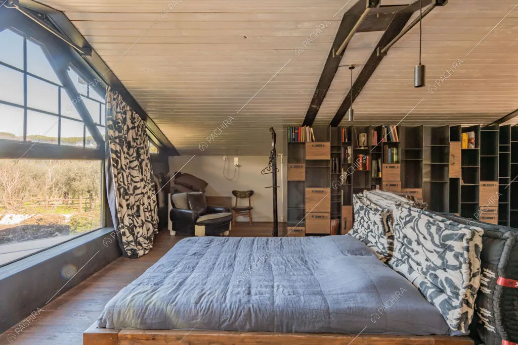 Camera da letto della location Seine, loft in stile industriale a Roma