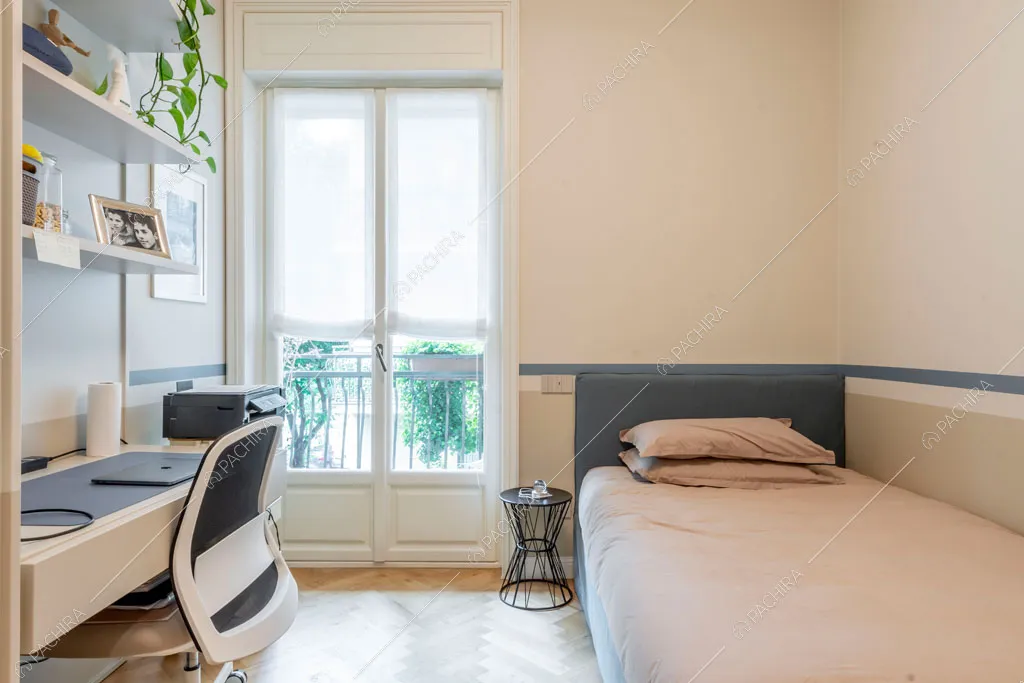 Camera da letto dell'appartamento Capsico, location in stile contemporaneo a Milano