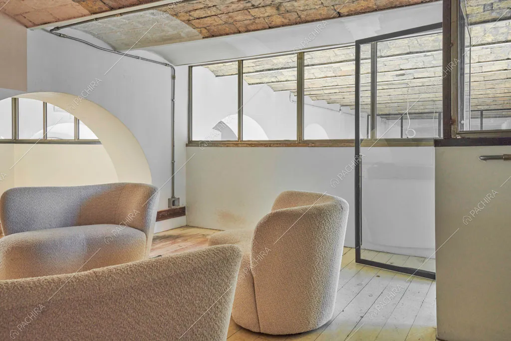 Salotto del loft Manaslu, location in stile minimal a Roma