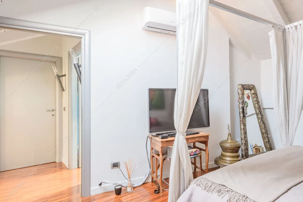 Camera da letto del loft Cascarilla, location in stile moderno a Milano