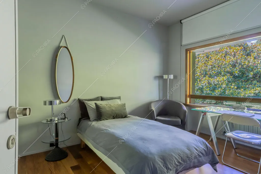 Camera da letto della villa Biotite, location in stile moderno a Verona