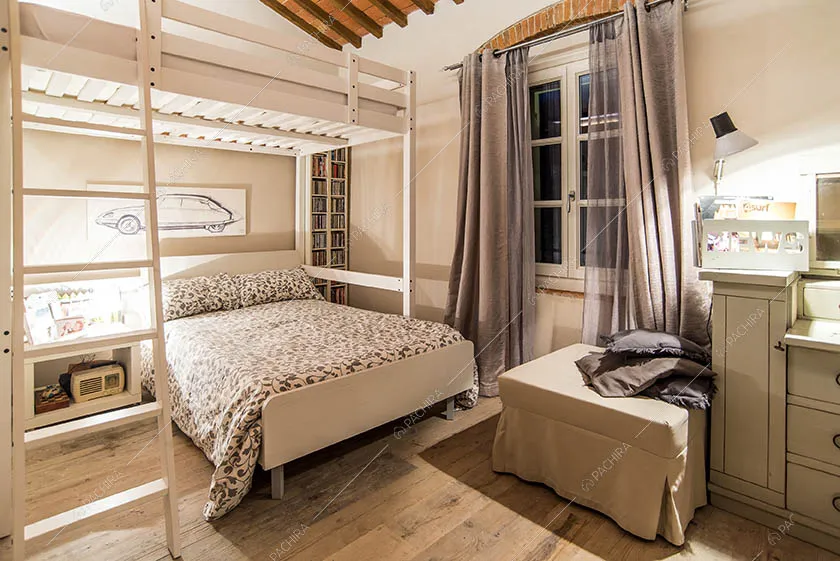 Camera da letto della villa Amorfa, location in stile moderno a Pistoia