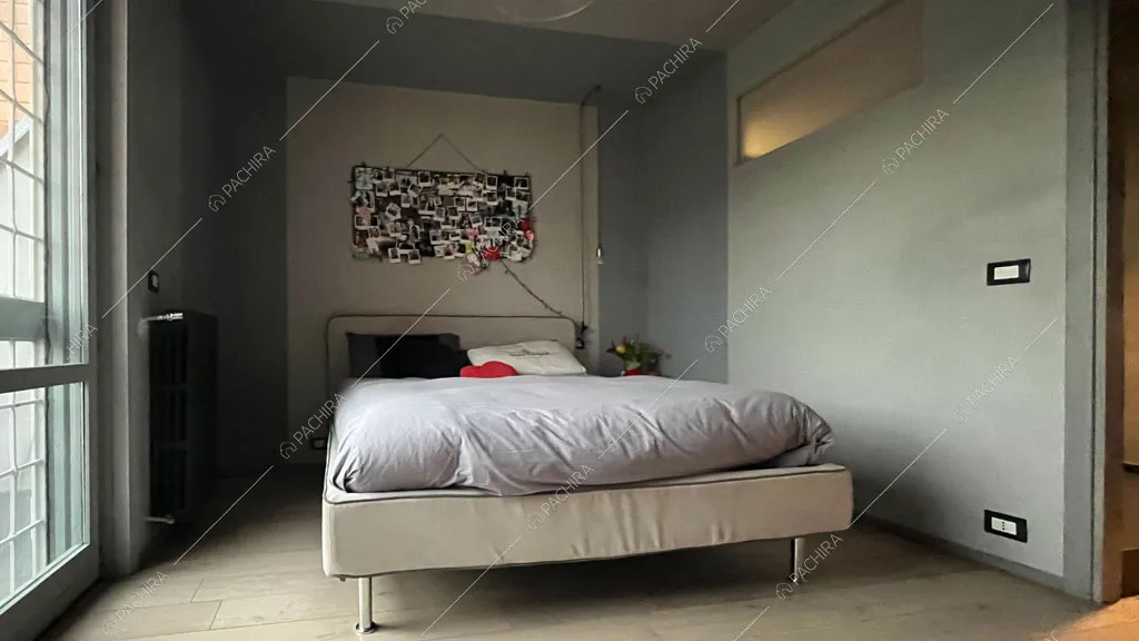 Camera da letto della villa Andesine, location in stile moderno a Roma