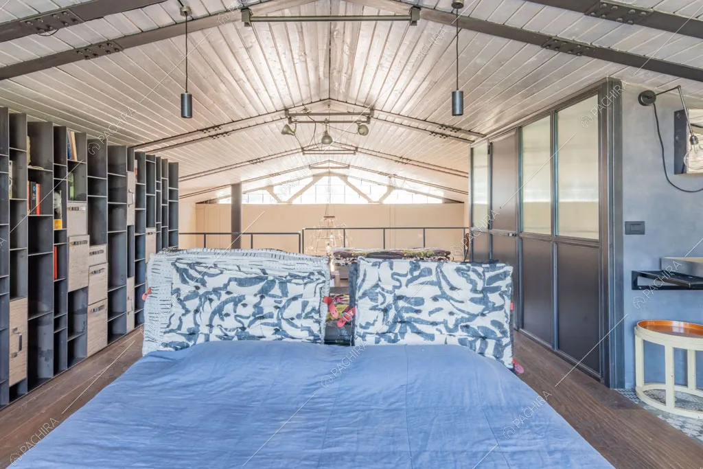 Camera da letto della location Seine, loft in stile industriale a Roma