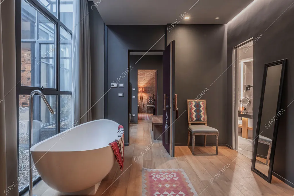 Vasca nella camera da letto del loft Berillio, location in stile contemporaneo a Roma
