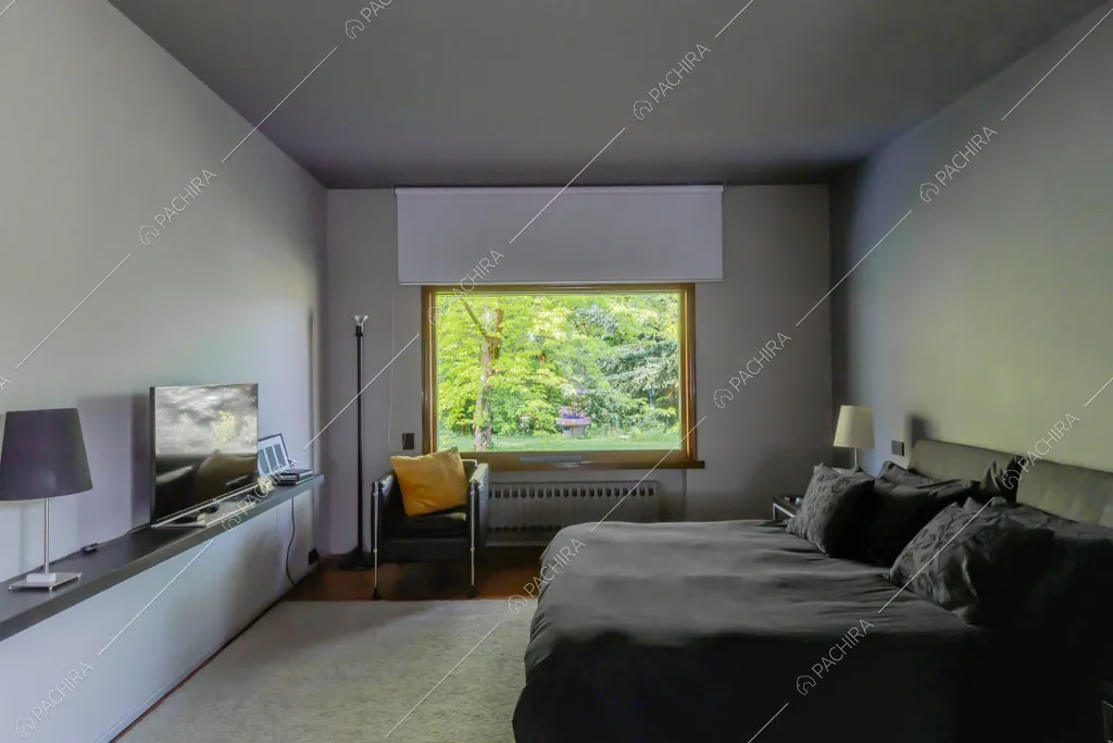 Camera da letto della villa Biotite, location in stile moderno a Verona