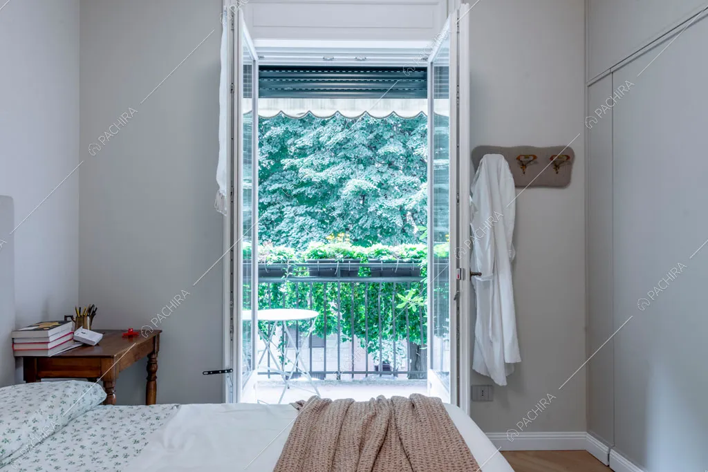Camera da letto dell'appartamento Capsico, location in stile contemporaneo a Milano