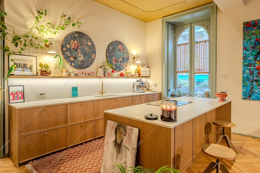 Cucina a isola dell'appartamento Buganvilla, location in stile moderno a Milano