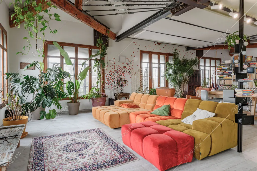 Salotto con vetrate del loft Ostro, location in stile contemporaneo a Milano