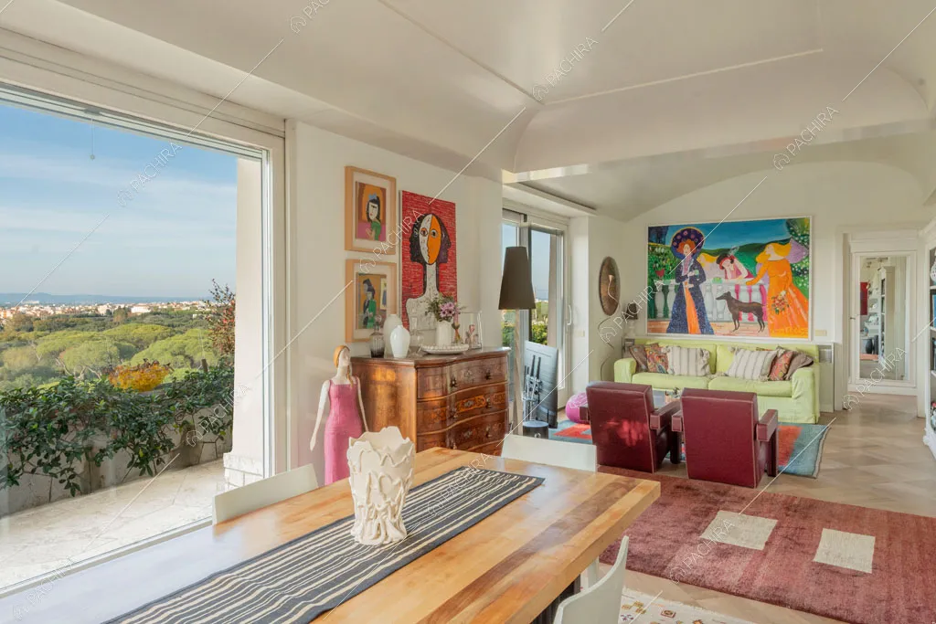 Zona living dell'attico Elbrus, location in stile contemporaneo a Roma