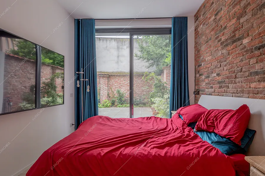 Camera da letto del loft Ob, location in stile moderno a Milano