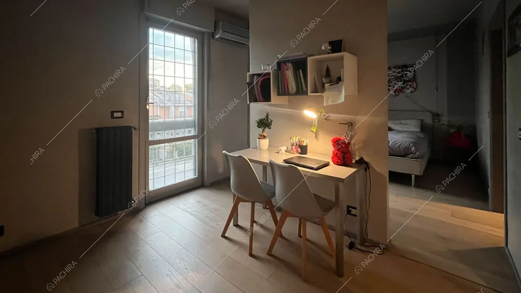 Camera da letto della villa Andesine, location in stile moderno a Roma