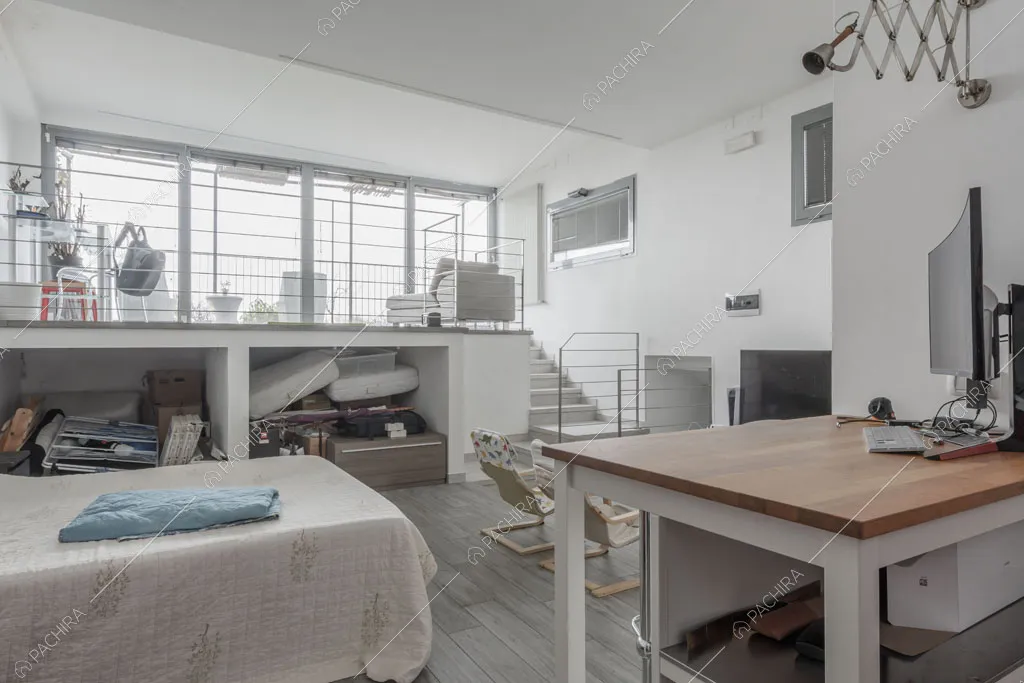 Camera da letto del loft Ostro, location in stile contemporaneo a Milano