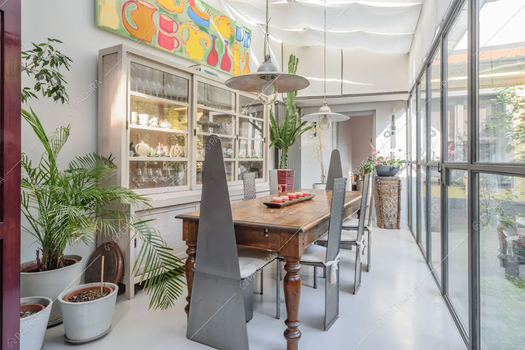 Sala da pranzo del loft Cascarilla, location in stile moderno a Milano