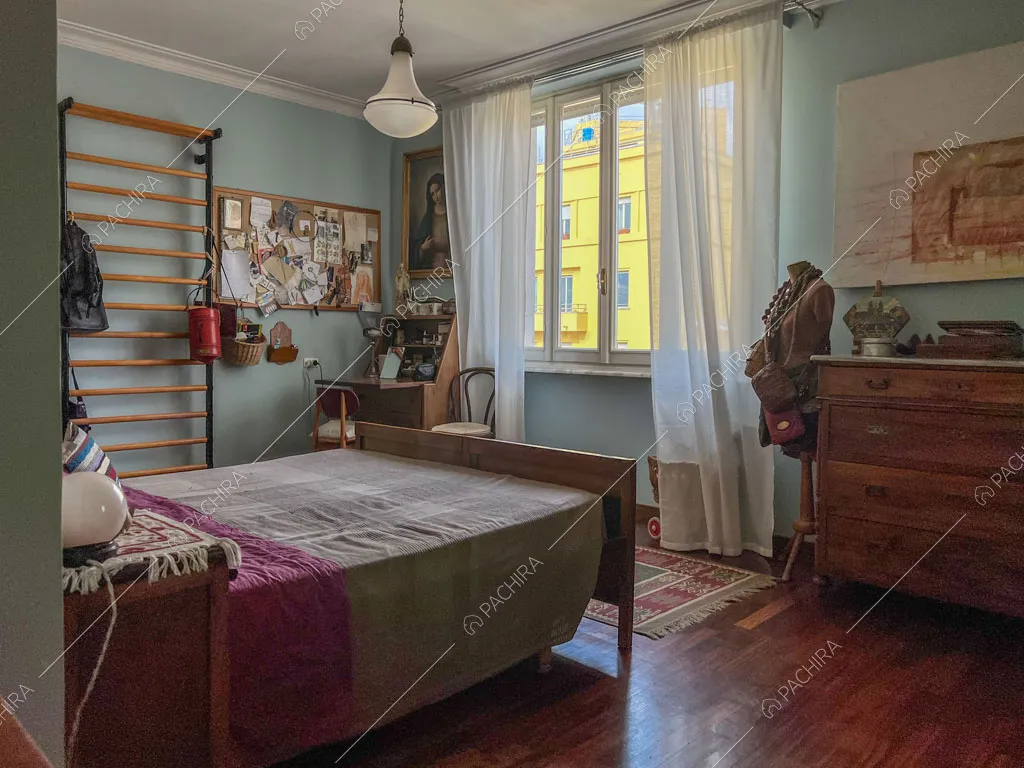Camera da letto dell'appartamento Kuban, location in stile moderno a Roma