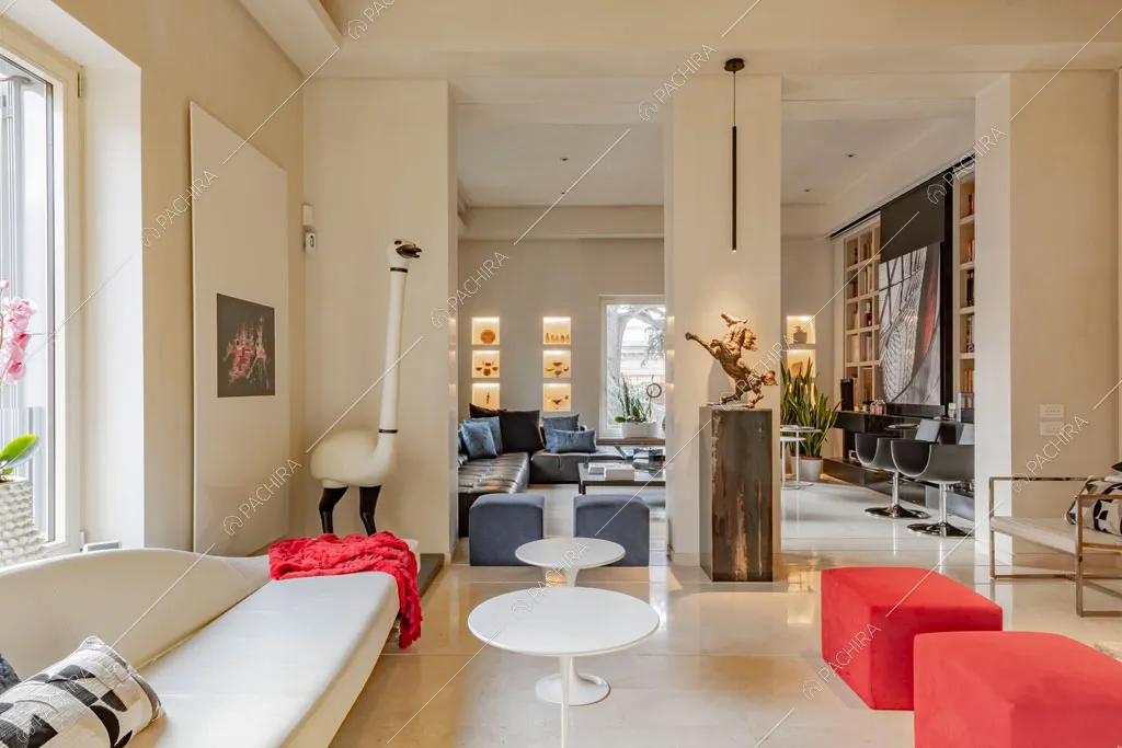 Ampia zona living dell'appartamento Kamala, location in stile contemporaneo a Roma