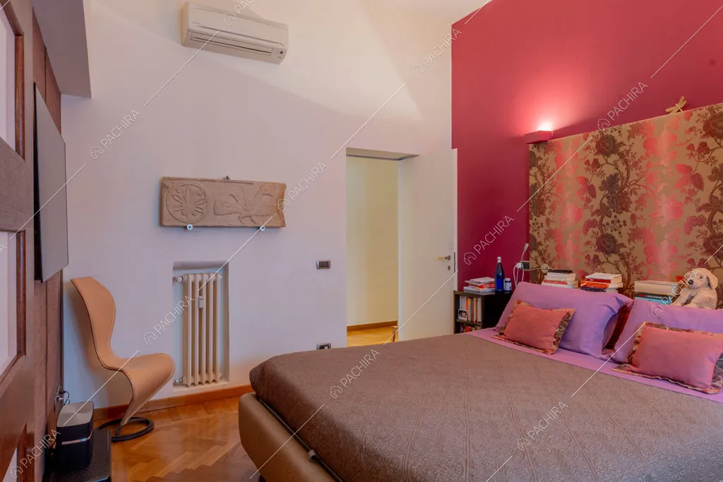 Camera da letto dell'appartamento Yalu, location in stile contemporaneo a Roma