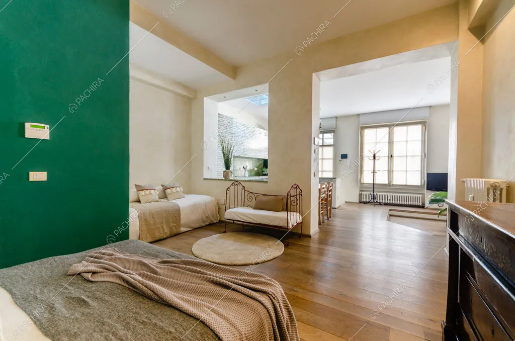 Camera da letto dell'appartamento Agrellite, location in stile moderno a Milano