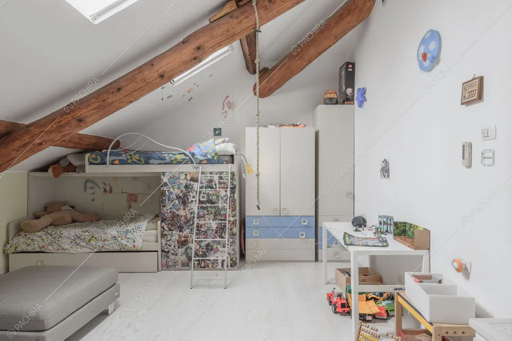 Camera da letto dei bambini del loft Ostro, location in stile contemporaneo a Milano
