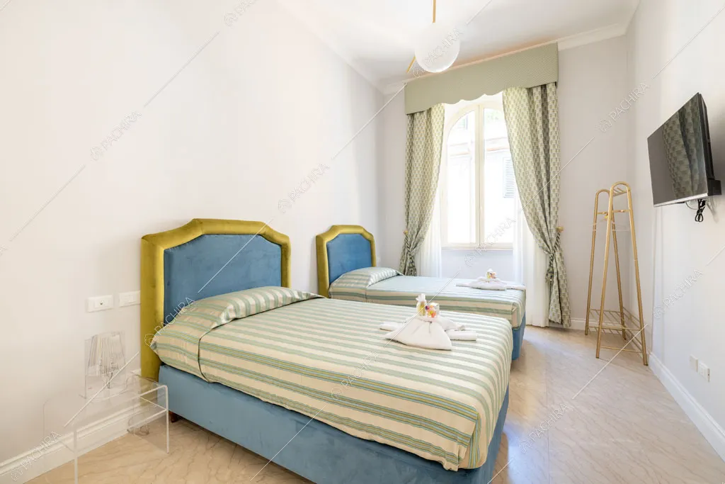 Camera da letto dell'appartamento Ural, location in stile moderno a Roma