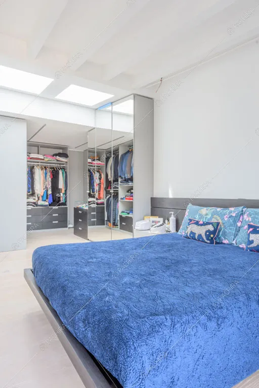 Camera da letto dell'appartamento Quiabo, location in stile contemporaneo a Milano
