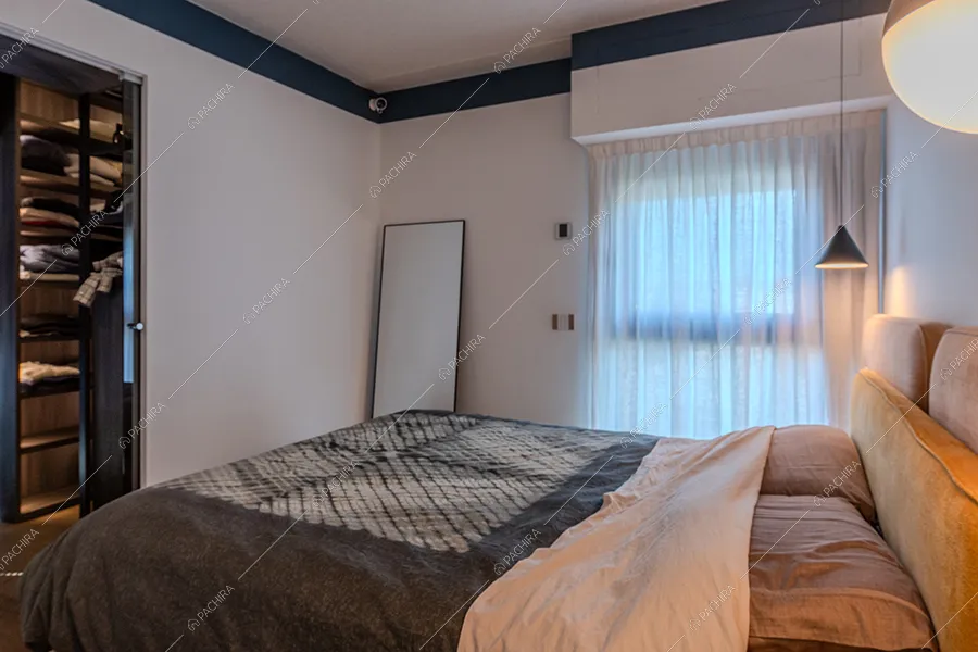 Camera da letto del loft Calluna, location in stile contemporaneo a Milano