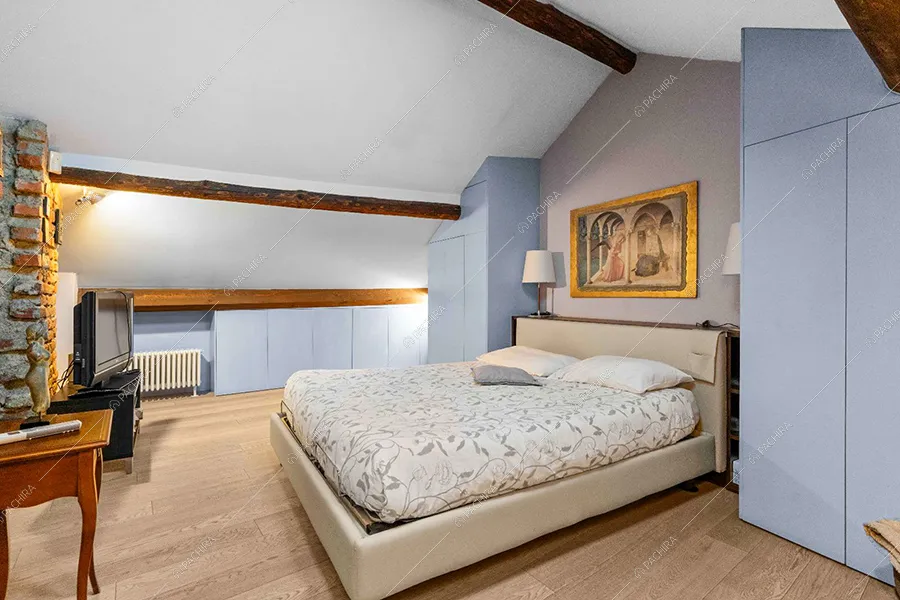 Camera da letto dell'appartamento Hood, location in stile moderno a Milano