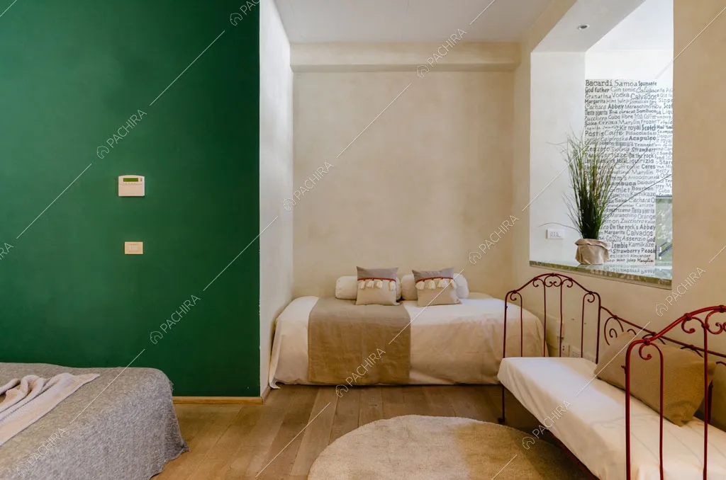Camera da letto dell'appartamento Agrellite, location in stile moderno a Milano