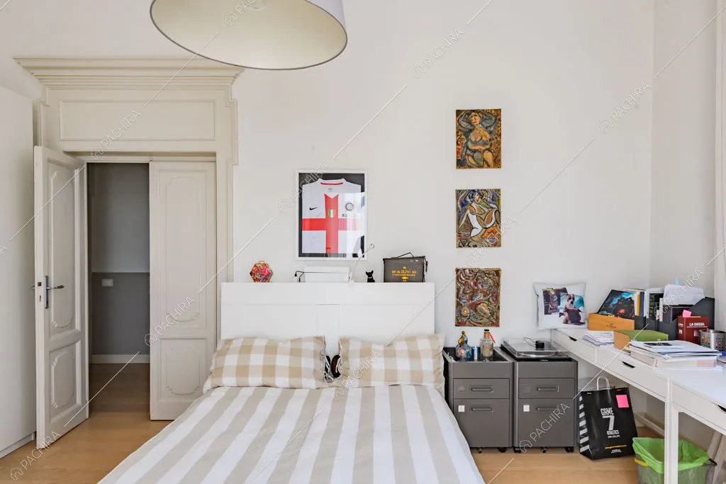 Camera da letto della villa Colorado, location in stile moderno a Varese