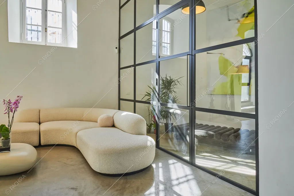 Zona living del loft Manaslu, location in stile minimal a Roma