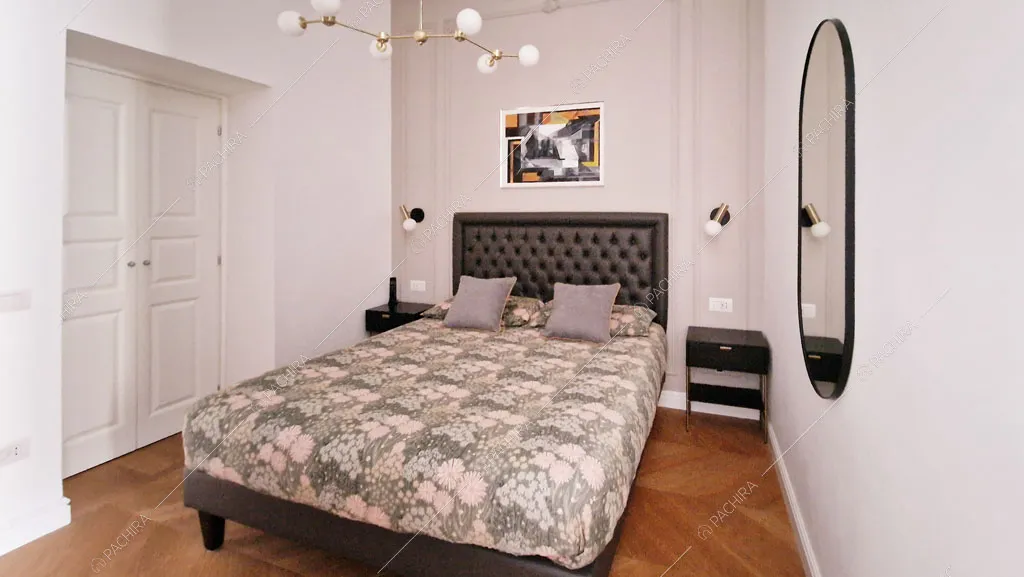 Camera da letto matrimoniale dell'appartamento Barents, location in stile contemporaneo a Roma