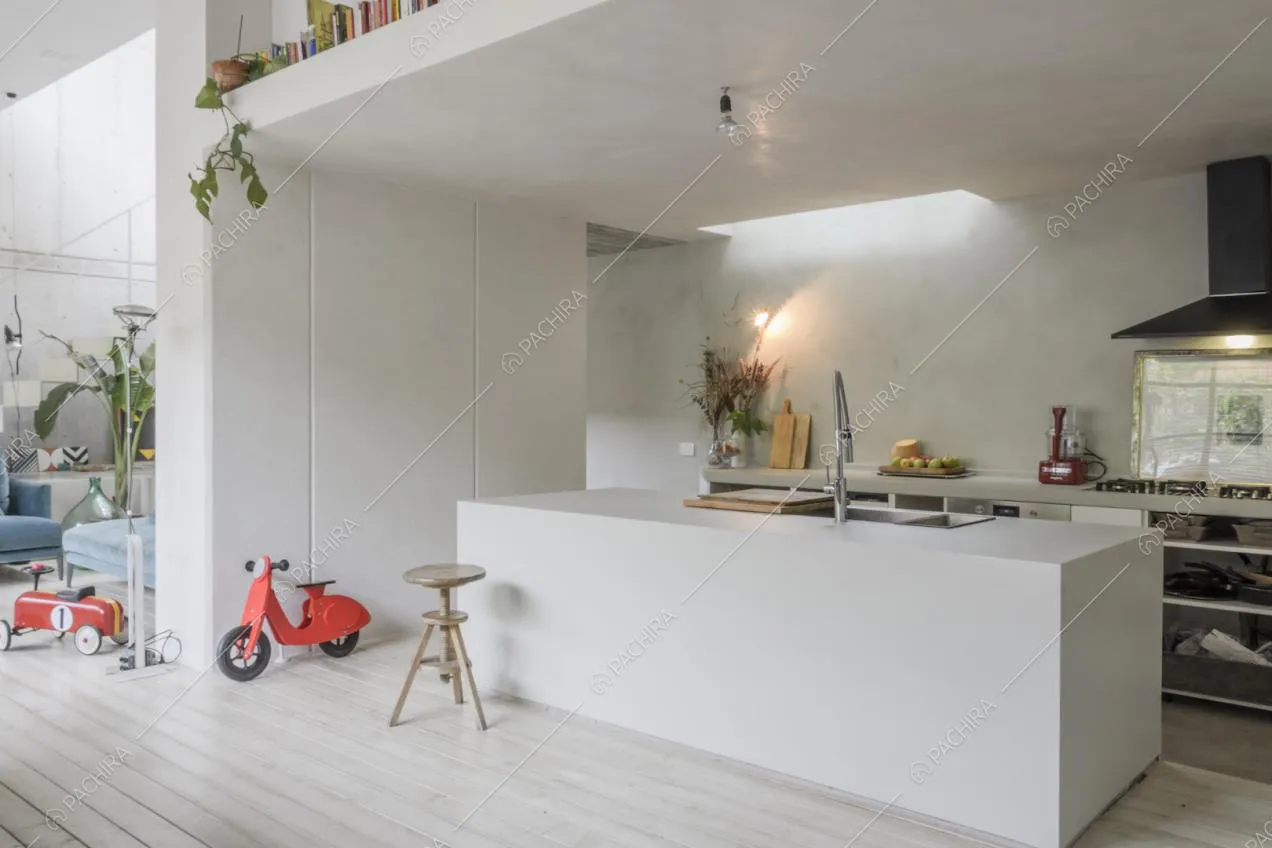 Cucina con isola nella zona giorno open space