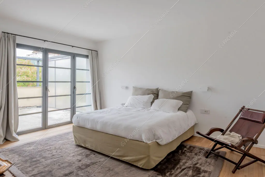 Camera da letto del loft Tigri, location in stile contemporaneo a Milano