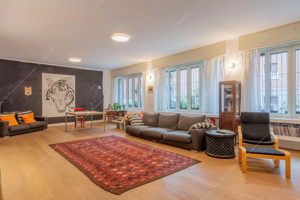 Zona living dell'appartamento Mungo, location in stile contemporaneo a Milano