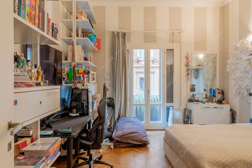 Camera da letto dell'appartamento Yalu, location in stile contemporaneo a Roma