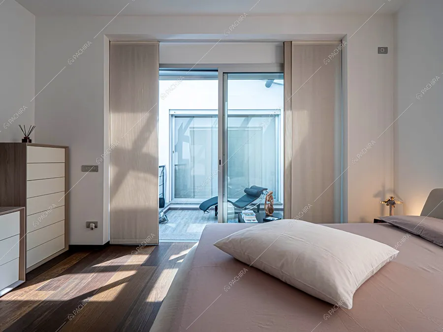 Camera da letto della villa Moonstone, location in stile moderno a Milano