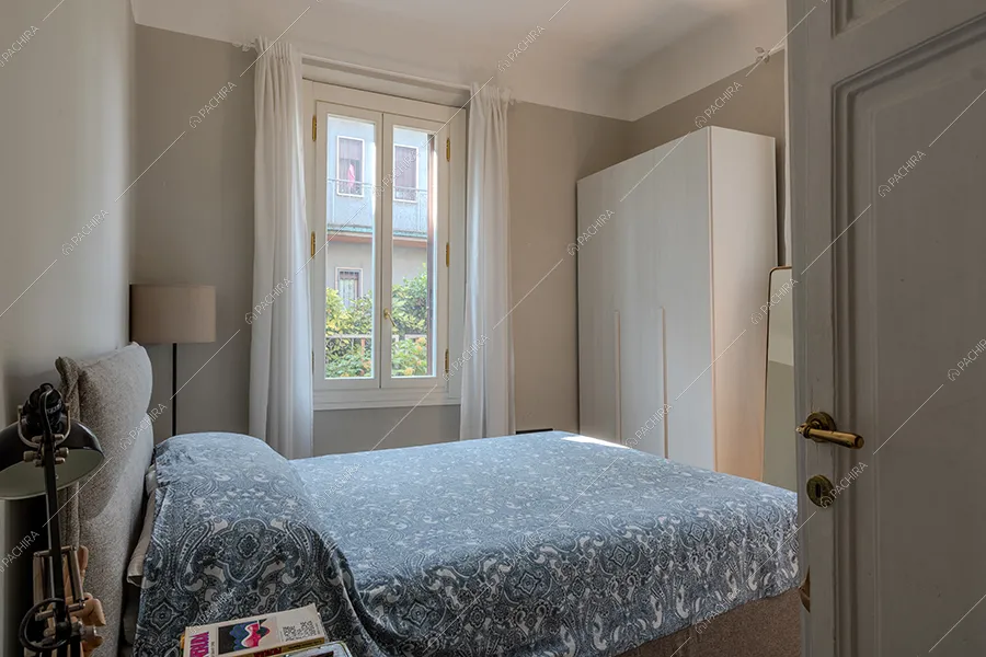 Camera da letto della villa Rame, location in stile classico a Milano