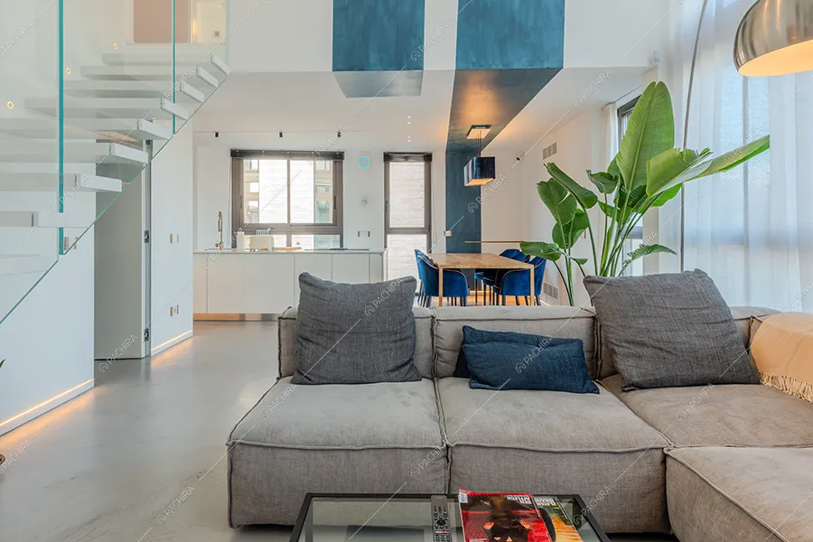 Zona living del loft Calluna, location in stile contemporaneo a Milano