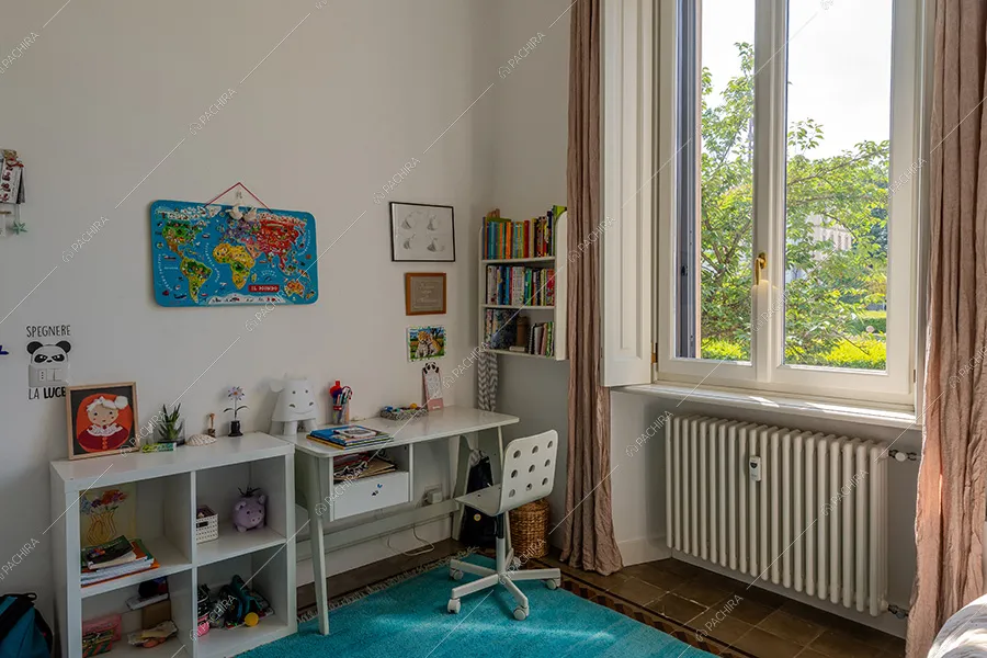 Camera da letto dell'appartamento Andira, location moderna per shooting a Milano