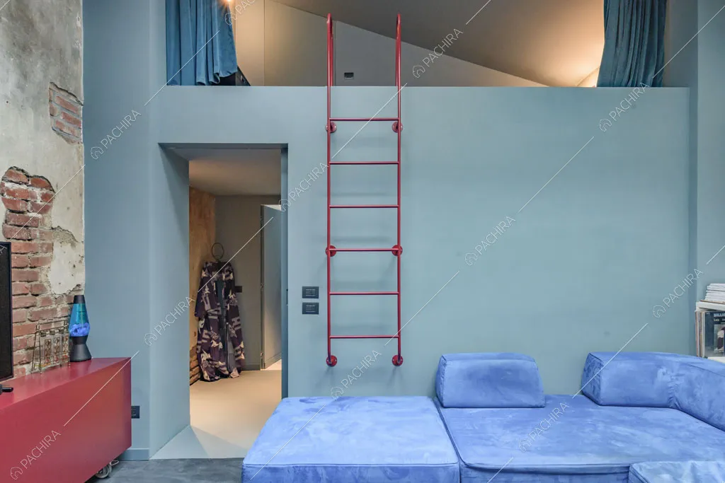 Camera da letto del loft Unakite, location in stile moderno a Milano