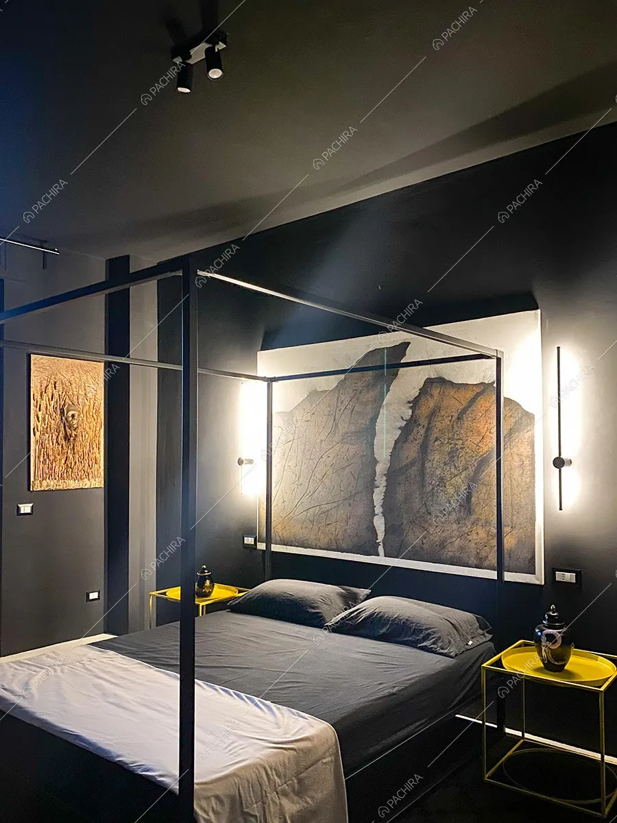 Camera da letto dell'appartamento moderno Goro, location per shooting a Milano