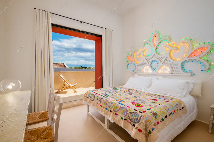 Camera da letto della masseria Chinook, location in stile contemporaneo a Lecce